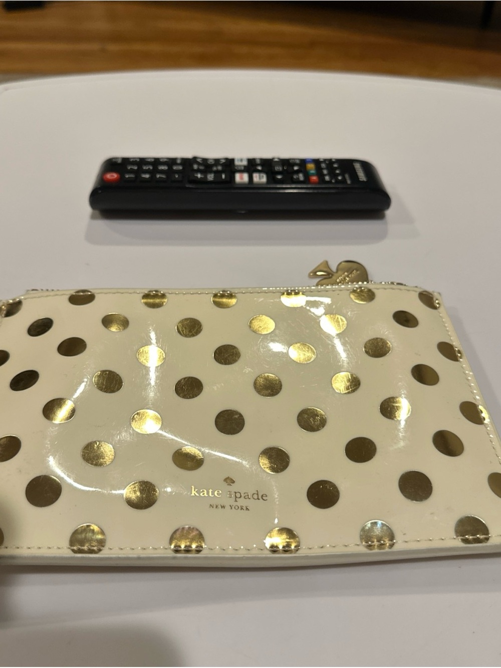kate spade Cream Patent Zip Pouch with Gold Polka Dots